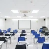 Classroom chairs and tables arrangement in coaching institute