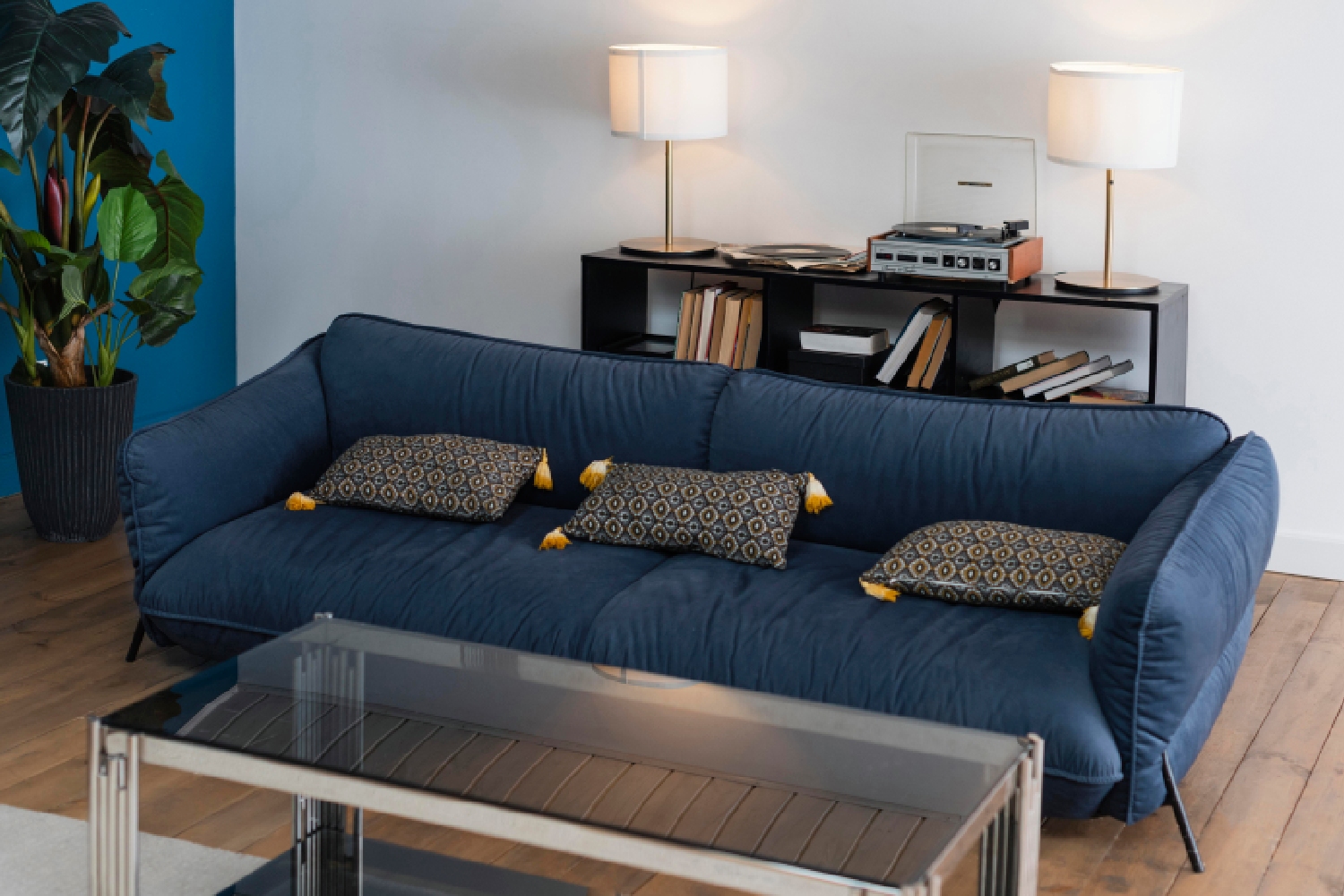 Image of a stylish 5 Seater Sofas arrangement acting as the Living Room Anchors to maximize Social Seating